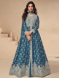 Woman wearing teal blue embroidered anarkali suit with dupatta