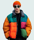 Man wearing colour block orange green and pink puffer jacket