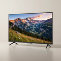 43 inch smart LED TV showing mountain landscape