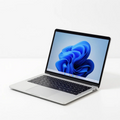 Silver 14 inch laptop with Windows 11 screen